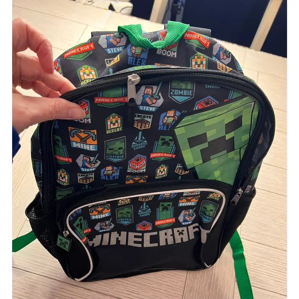 Minecraft backpack w/ 2 zippered sections. Measures 11